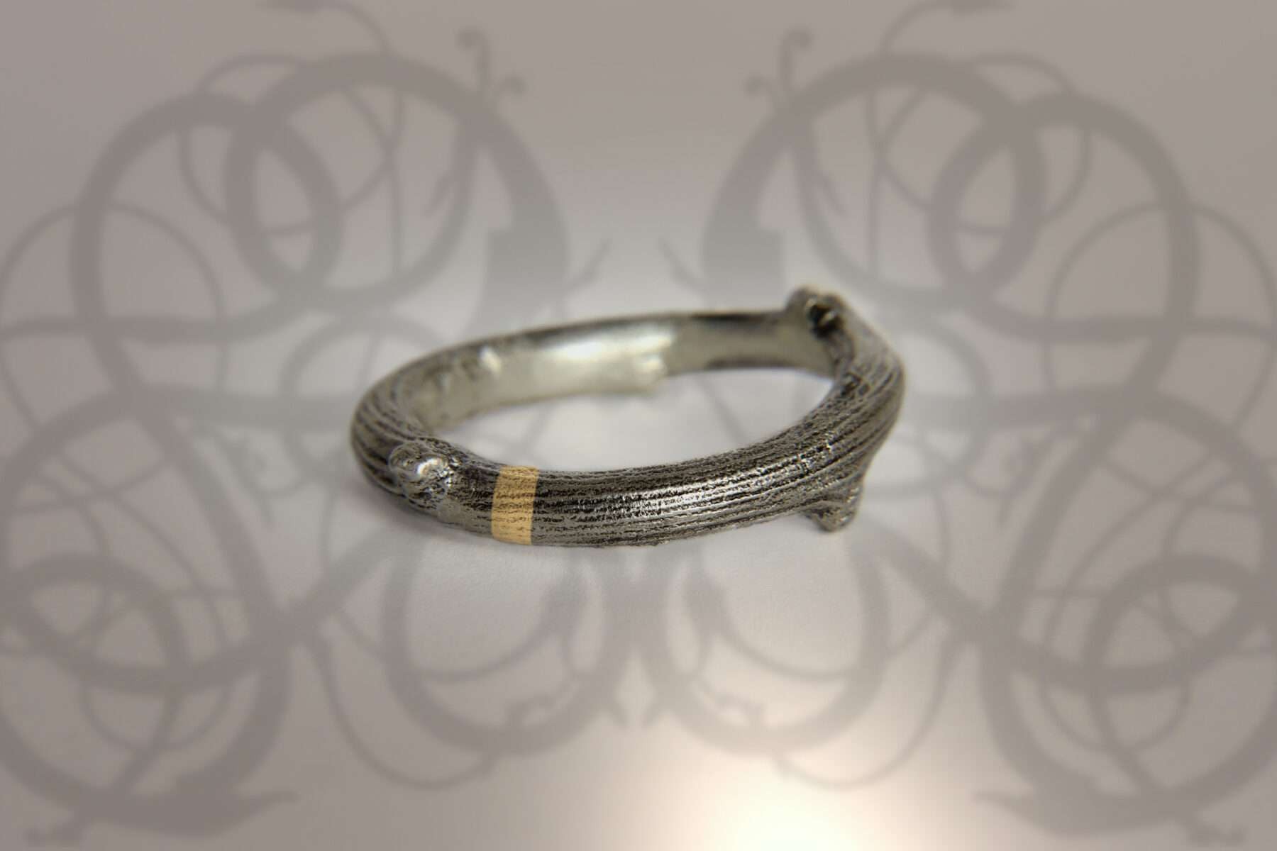 handmade twig viking ring in silver and gold