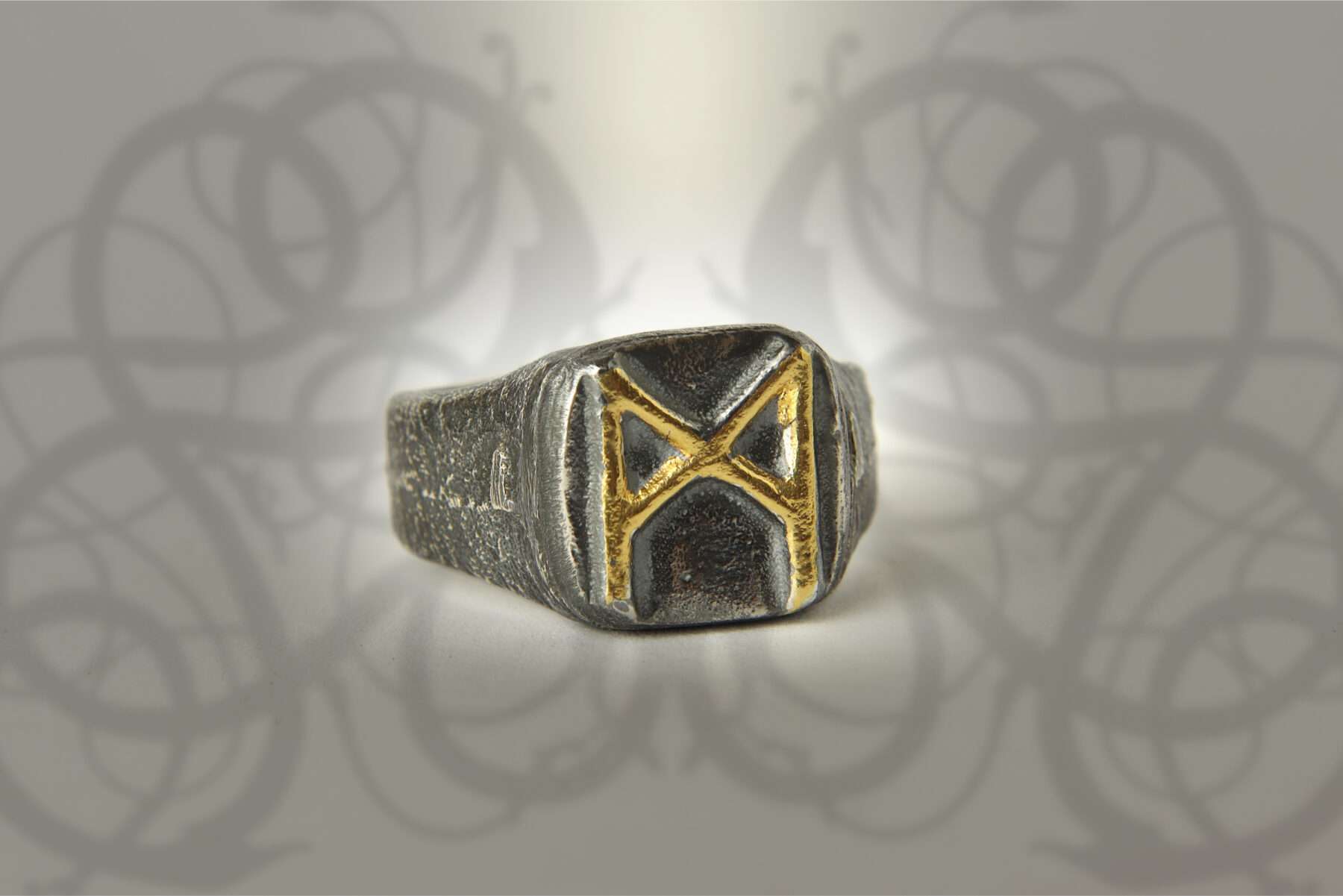 handmade silver and gold mannaz signet ring