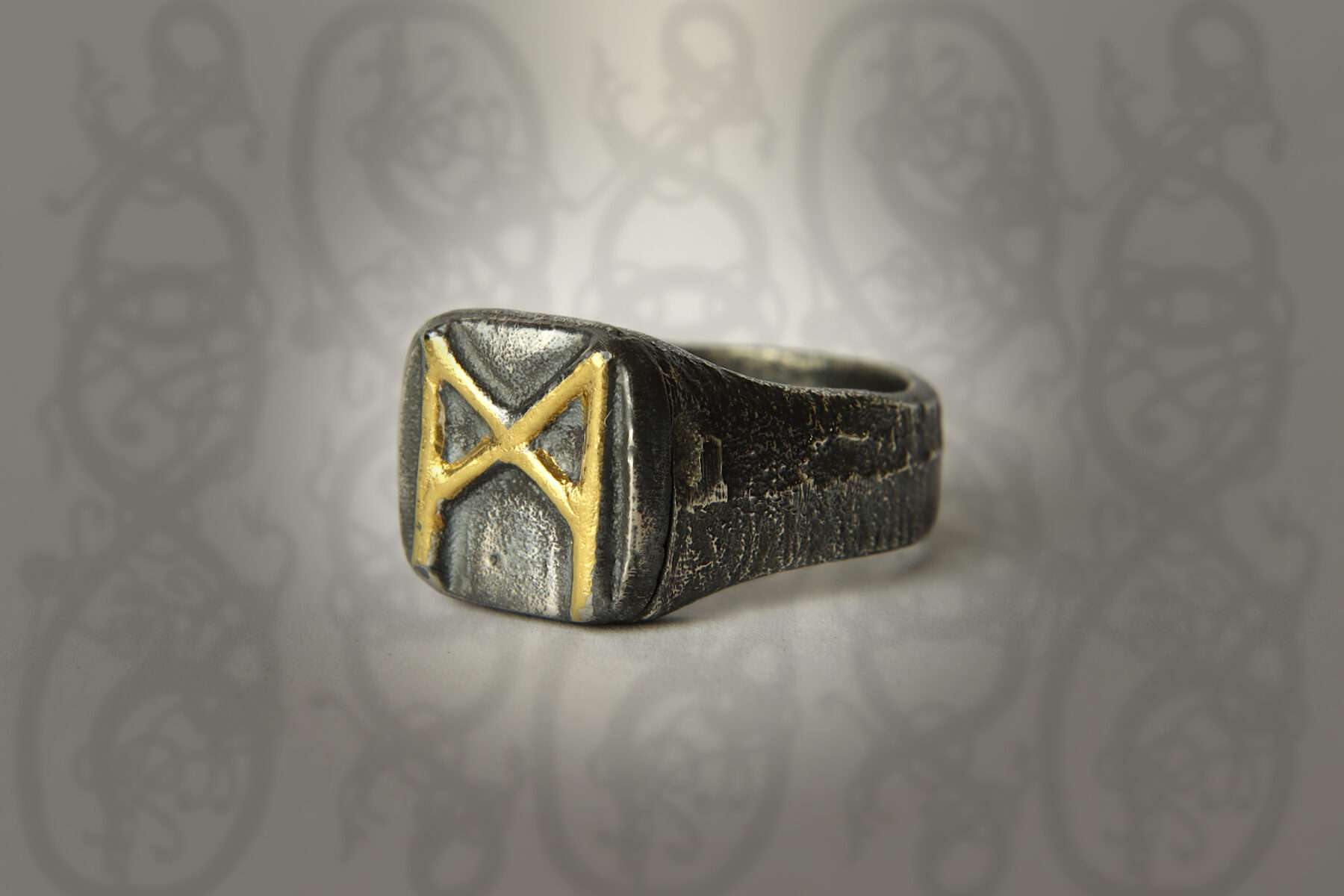 handmade silver and gold mannaz signet ring